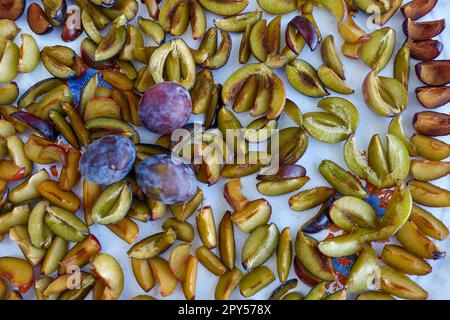 drying plums, homemade natural plum drying process Stock Photo