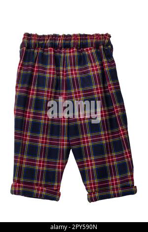 Summer shorts insulated. Close-up of a stylish fashionable plaid shorts with elasticated waistband. Back view. Tartan plaid fabric texture background. Stock Photo