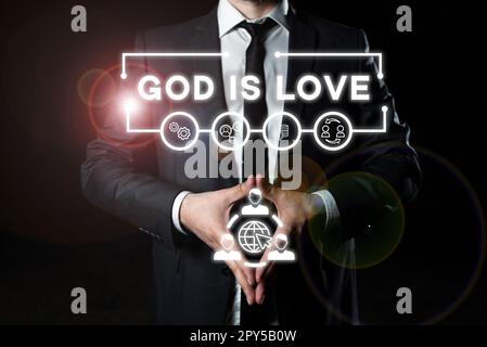Hand writing sign God Is Love. Word Written on Believing in Jesus having faith religious thoughts Christianity Stock Photo