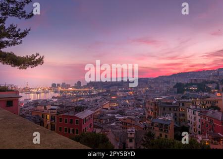 Genoa, Italy - 06 12 2021: View of the port of Genoa at sunset from Spianata Castelletto. Stock Photo