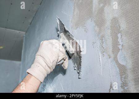application of insulation to the wall against moisture and water Stock Photo
