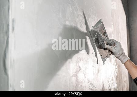 application of insulation to the wall against moisture and water Stock Photo