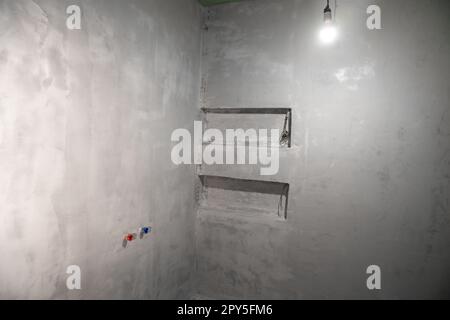 room with plastered walls on the construction site Stock Photo