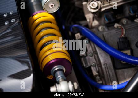 Close up of motorcycle shock absorber on back wheel Stock Photo