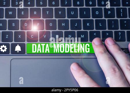Text caption presenting Data Modeling. Internet Concept process of transferring data between data storage systems Stock Photo