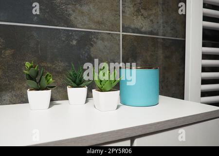 Green towel on radiator in bathroom Stock Photo Alamy