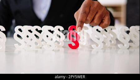 Businessman's Hand Holding Red Paragraph Stock Photo