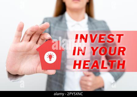 Sign displaying Invest In Your Health. Word Written on Live a Healthy Lifestyle Quality Food for Wellness Stock Photo