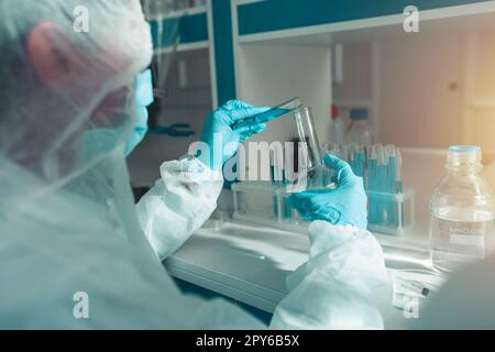 Doctor in the laboratory analyzes samples for scientific research Stock Photo