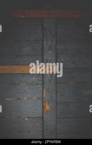 Close up battered wooden door from internal side concept photo Stock Photo