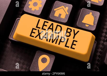 Text caption presenting Lead By Example. Business overview Be a mentor leader follow the rules give examples Coach Stock Photo