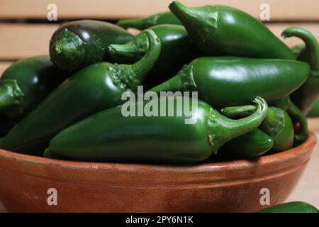 Bowl of Fresh Green Jalapeno Peppers in Rustic Kitchen Stock Photo