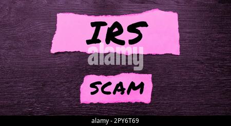 Inspiration showing sign Irs Scam. Word Written on targeted taxpayers by pretending to be Internal Revenue Service Stock Photo