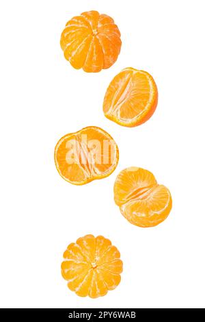 Falling peeled sliced tangerine isolated on white Stock Photo