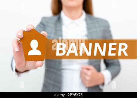 Writing displaying text Banner. Word Written on long strip cloth bearing slogan or design carried in public place Stock Photo