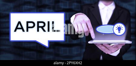 Text sign showing April. Internet Concept Opening buds of the flowers of spring season Fourth month of the year Stock Photo