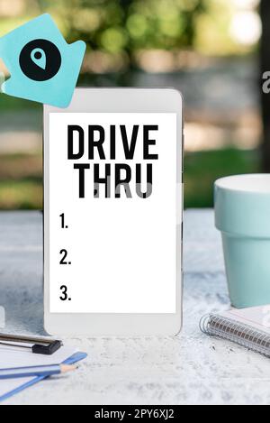 Writing displaying text Drive Thru. Conceptual photo place where you can get type of service by driving through it Stock Photo