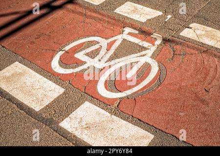 Cycle path, bicycle symbol as a lane marking or road marking on a road Stock Photo