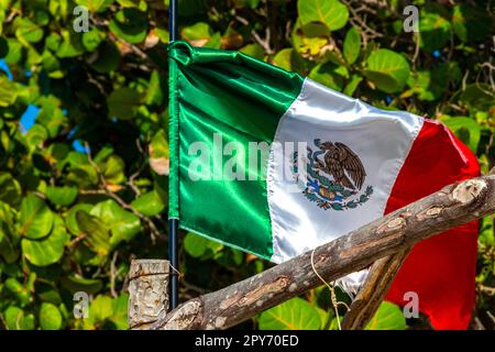 Mexican green white red flag in Playa del Carmen Mexico. Stock Photo