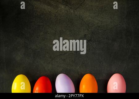 dyed colorful Easter eggs on grey concrete background top view. Holiday banner, card, concept, design. copy space Happy Easter holiday Stock Photo