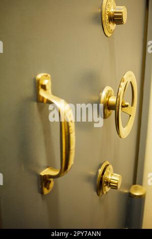 Close-up of an old bank safe with combination lock Stock Photo