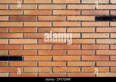 Background from a brown clinkered wall Stock Photo