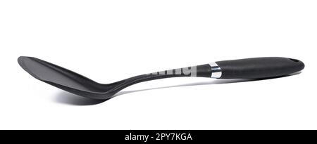 Plastic black spatula for cooking on a white isolated background Stock Photo