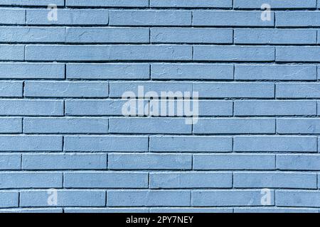 Background from a painted blue stone wall Stock Photo