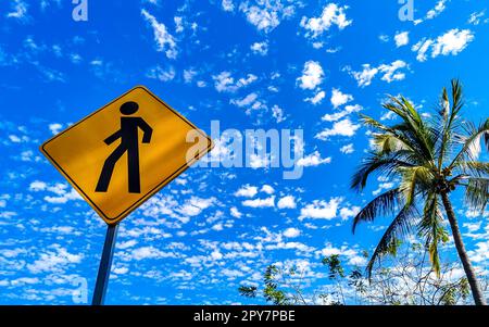 Yellow pedestrian sign street sign in Puerto Escondido Mexico. Stock Photo