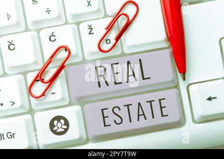 Text sign showing Real Estate. Business idea the property consisting of land and the buildings on it Stock Photo