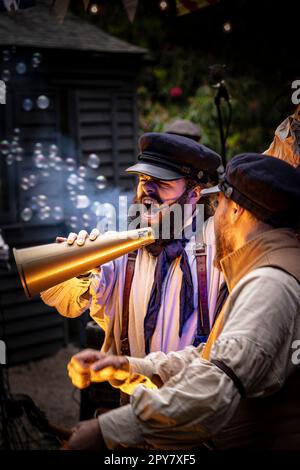 Old Time Sailors performing at Trebah Garden Amphitheatre in Cornwall in the UK. Stock Photo