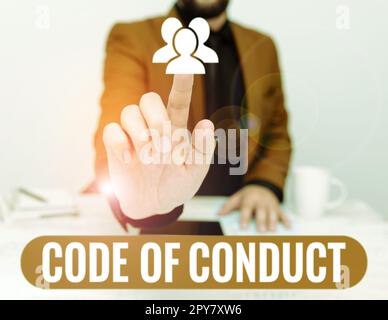 Writing displaying text Code Of Conduct. Word for Ethics rules moral codes ethical principles values respect Stock Photo