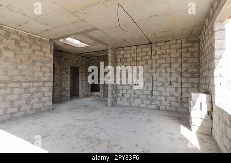 Construction of an individual residential building, walls made of expanded clay concrete block, monolithic concrete floor and reinforced concrete floors Stock Photo