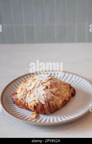 Freshly baked French croissant served in coffee shop Stock Photo