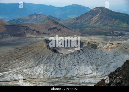 Aso, Japan - April 28, 2023: Mount Nakadake is one of the five peaks that make up Mount Aso, the largest volcano in Japan. Stock Photo