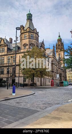 a big old vintage town church hall building on the side of the road of a famous city street Stock Photo