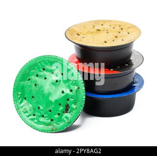 Used coffee capsules for coffee machine on a white background, plastic packaging Stock Photo