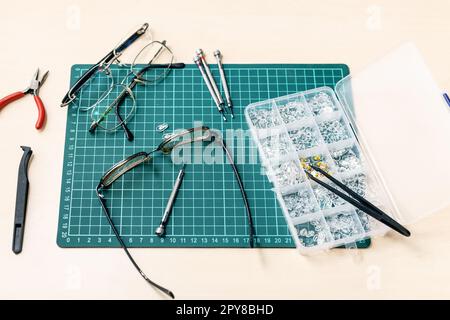 kit for replacement of eyeglass nose pads on table Stock Photo
