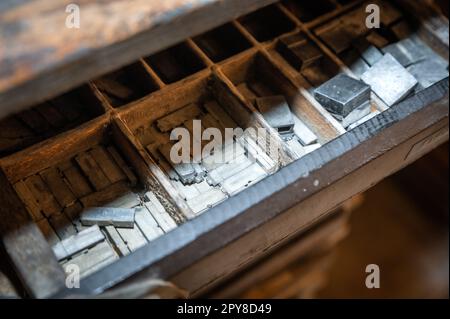 Old printing compagny with metal letters Stock Photo