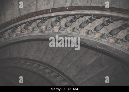 Winding stairs in old building interior photo Stock Photo