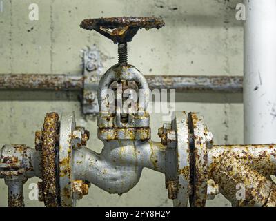 Close-up of an old rusted shut-off valve Stock Photo