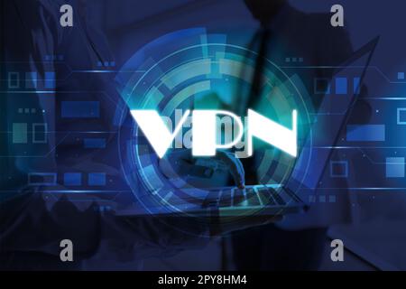 Woman using modern laptop with switched on VPN in office, closeup Stock Photo