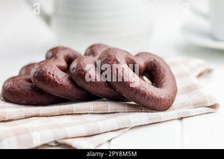 Sweet chocolate hearts on checkered napkin. Stock Photo
