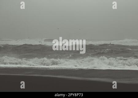Rough ocean at stormy weather monochrome landscape photo Stock Photo