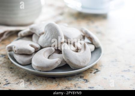 Gingerbread cookies with the sugar icing on plate. Stock Photo