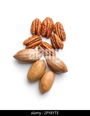 Peeled pecan nuts isolated on white background. Stock Photo