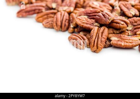 Peeled pecan nuts isolated on white background. Stock Photo
