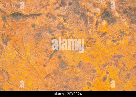 Grunge yellow old painted stone wall Stock Photo