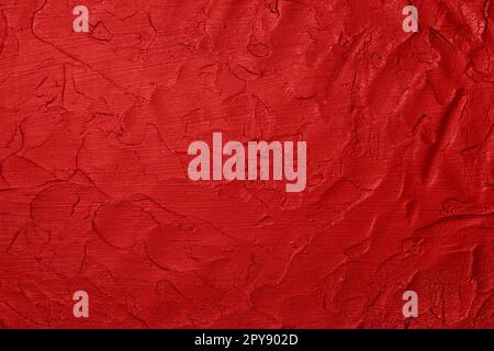 Red uneven grunge surface abstract background Stock Photo