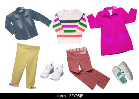 Collage set of girl spring summer clothes isolated. Female kids apparel collection. Child baby fashion clothing outfit. Colorful stylish jeans jacket, sweater, pants, shoes wearing. Stock Photo